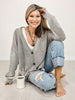 Long Sleeve Cardigan with Button Front and Distressed Hem