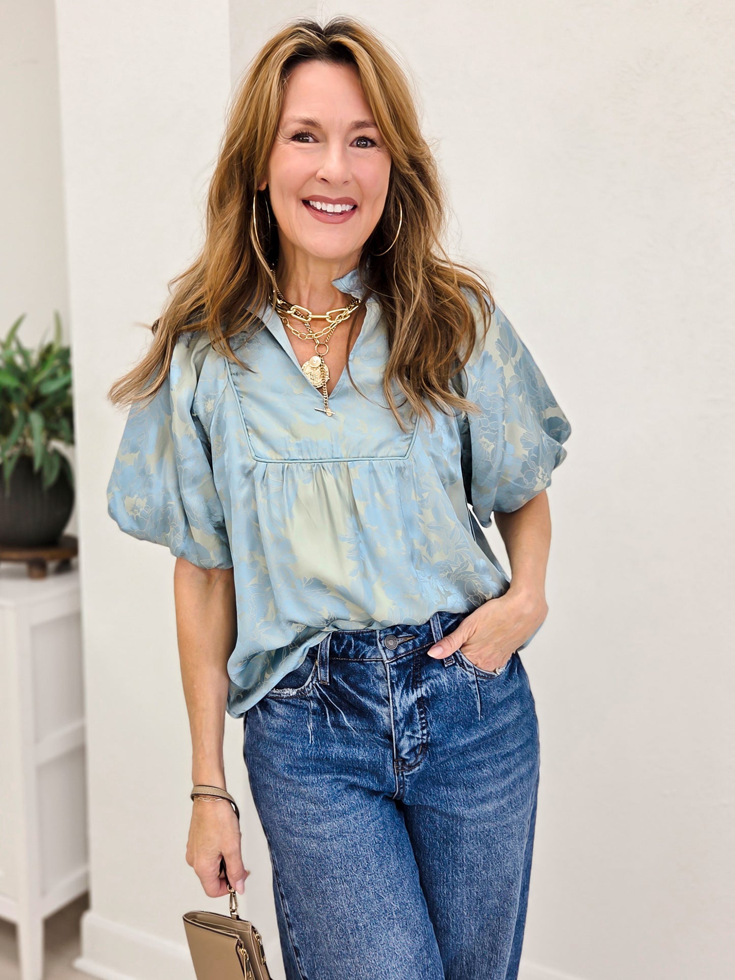 Short Puff Sleeve Top With A Ruffled Neckline And Notched V-Neck