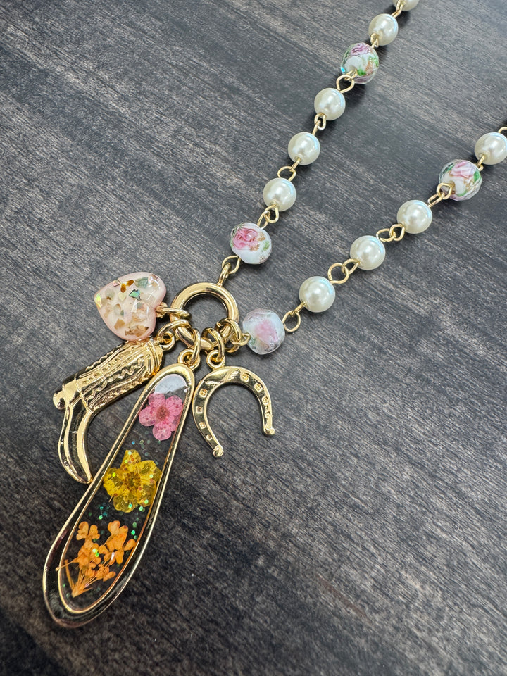 Pearl and Gold Necklace with Western and Floral Charms