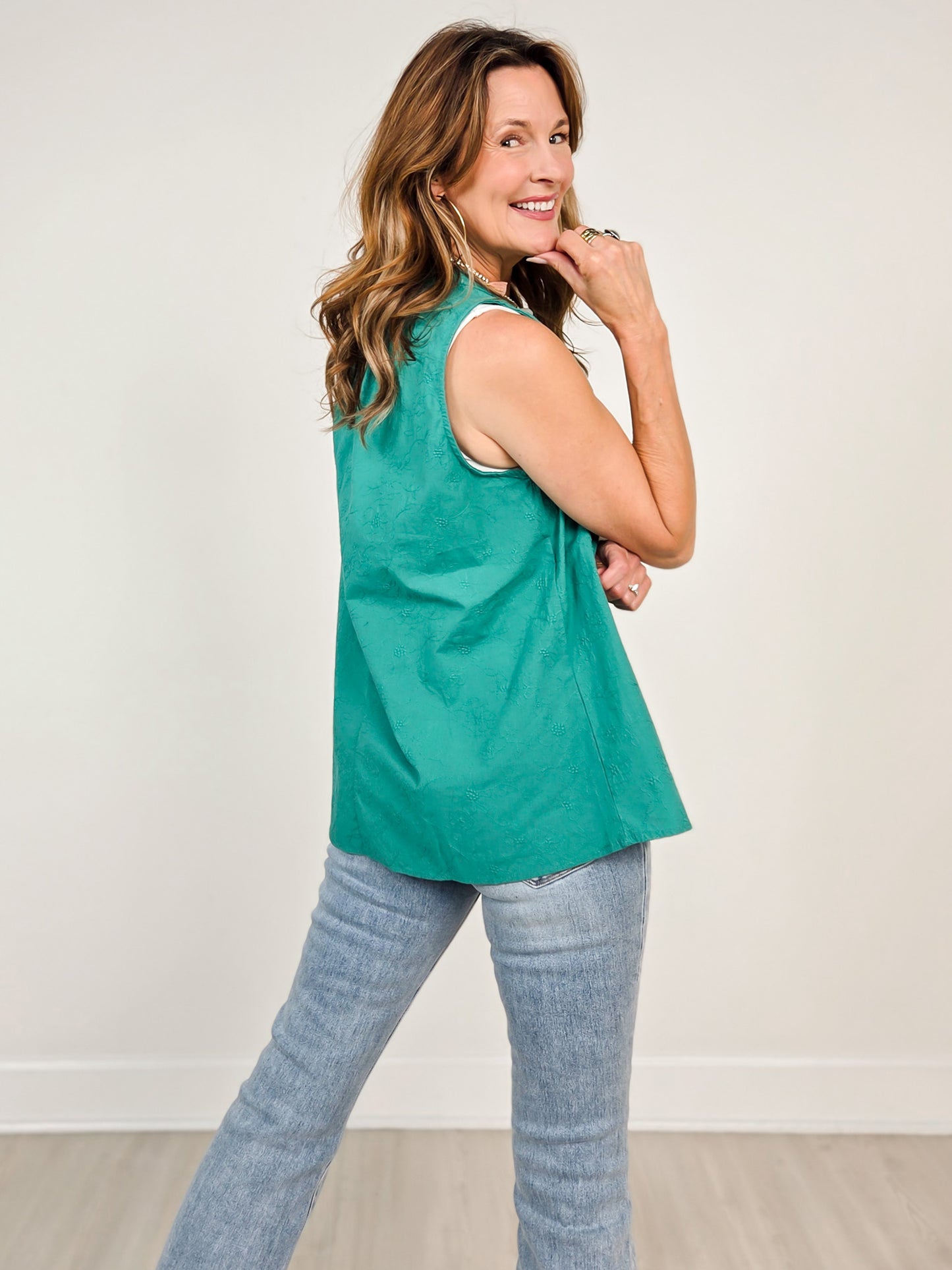Camellia Sleeveless Top with Ruffle Neckline in Emerald
