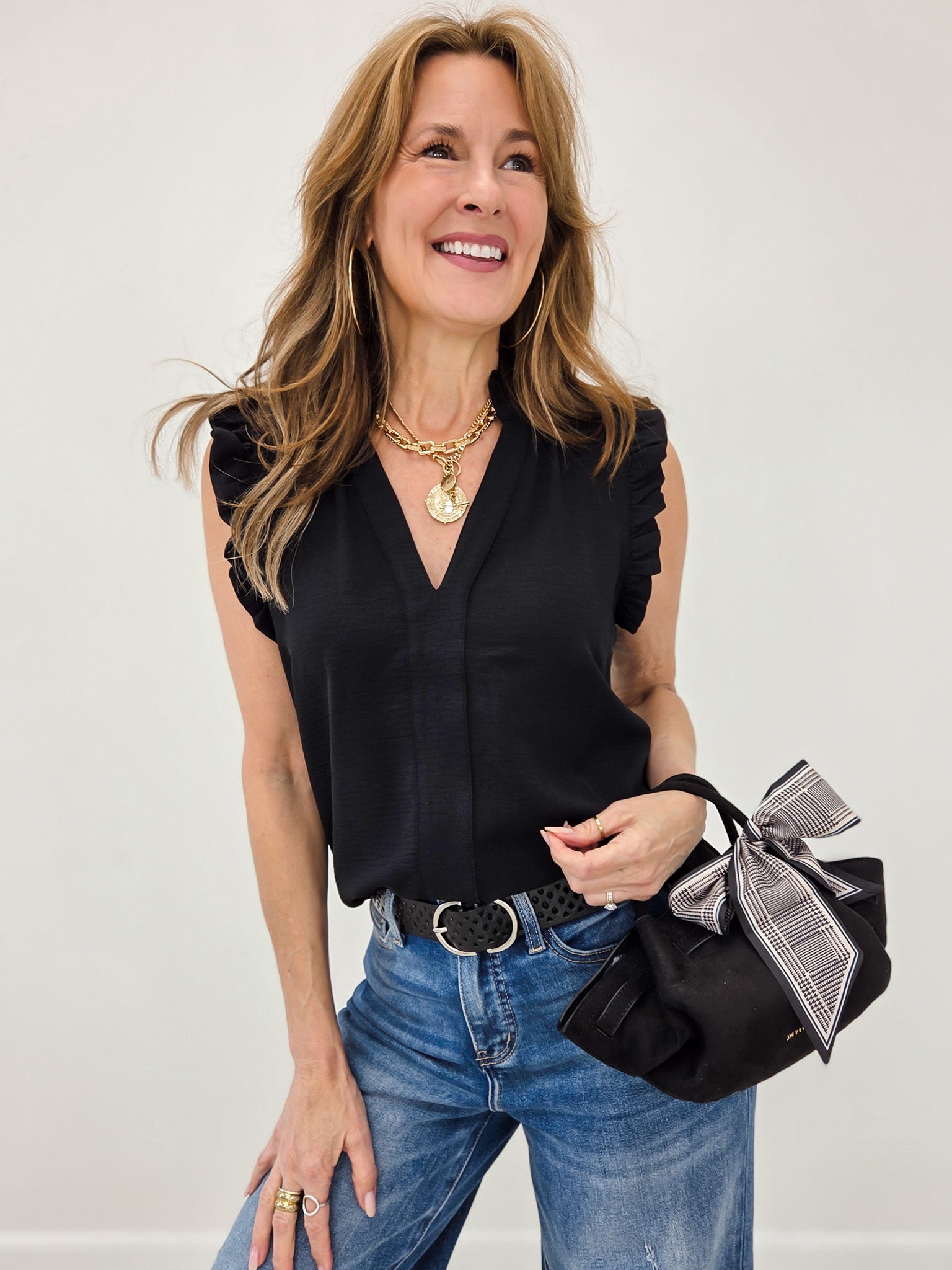 Sleeveless Flutter Sleeve Top with V-Neckline in Black