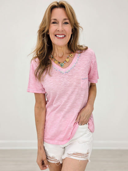 Short Sleeve Knit Shirt With A V-Neck Accented by Hand Stitch Detailing