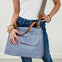 Luxurious Faux Denim Messenger Bag With Brown Accents