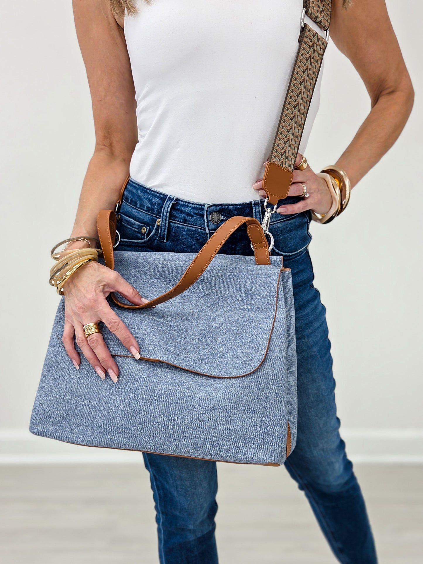 Luxurious Faux Denim Messenger Bag With Brown Accents