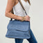 Luxurious Faux Denim Messenger Bag With Black Accents