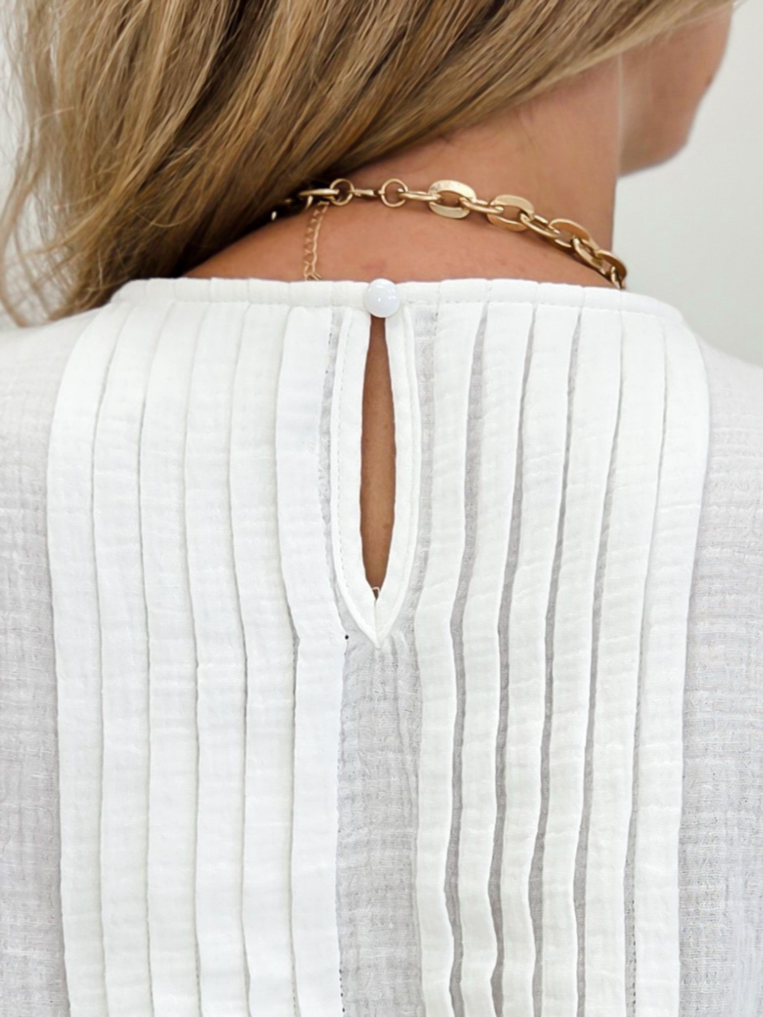Pintuck Detail Swing Hem Sleeveless Top