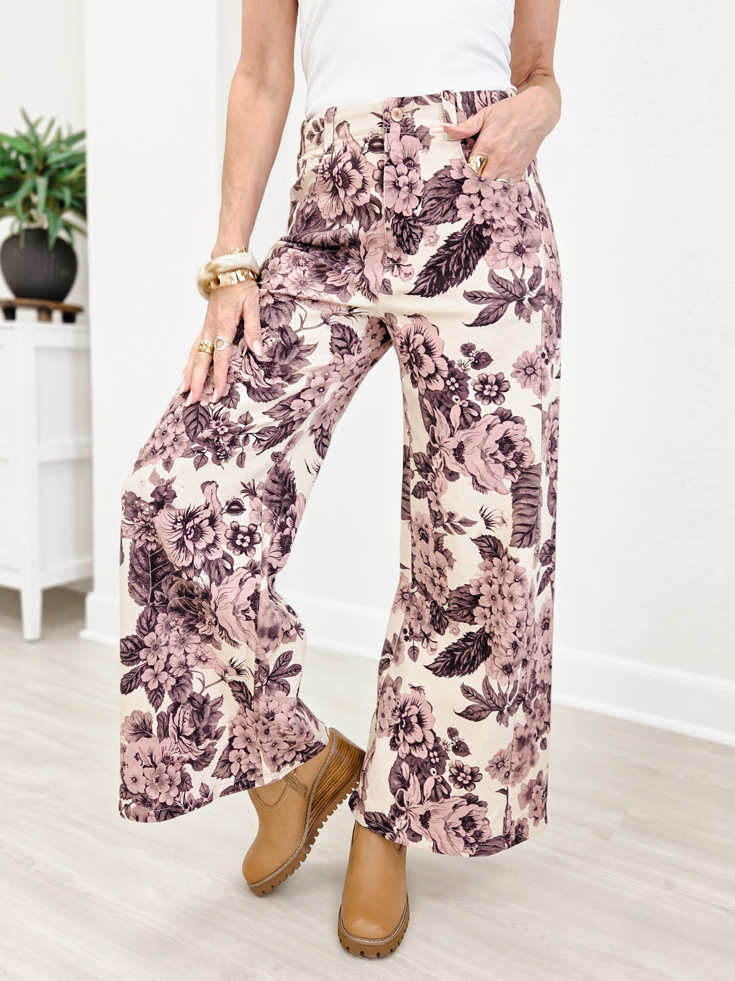 Wide Leg Pants Featuring Front Pockets With A Light Floral Design