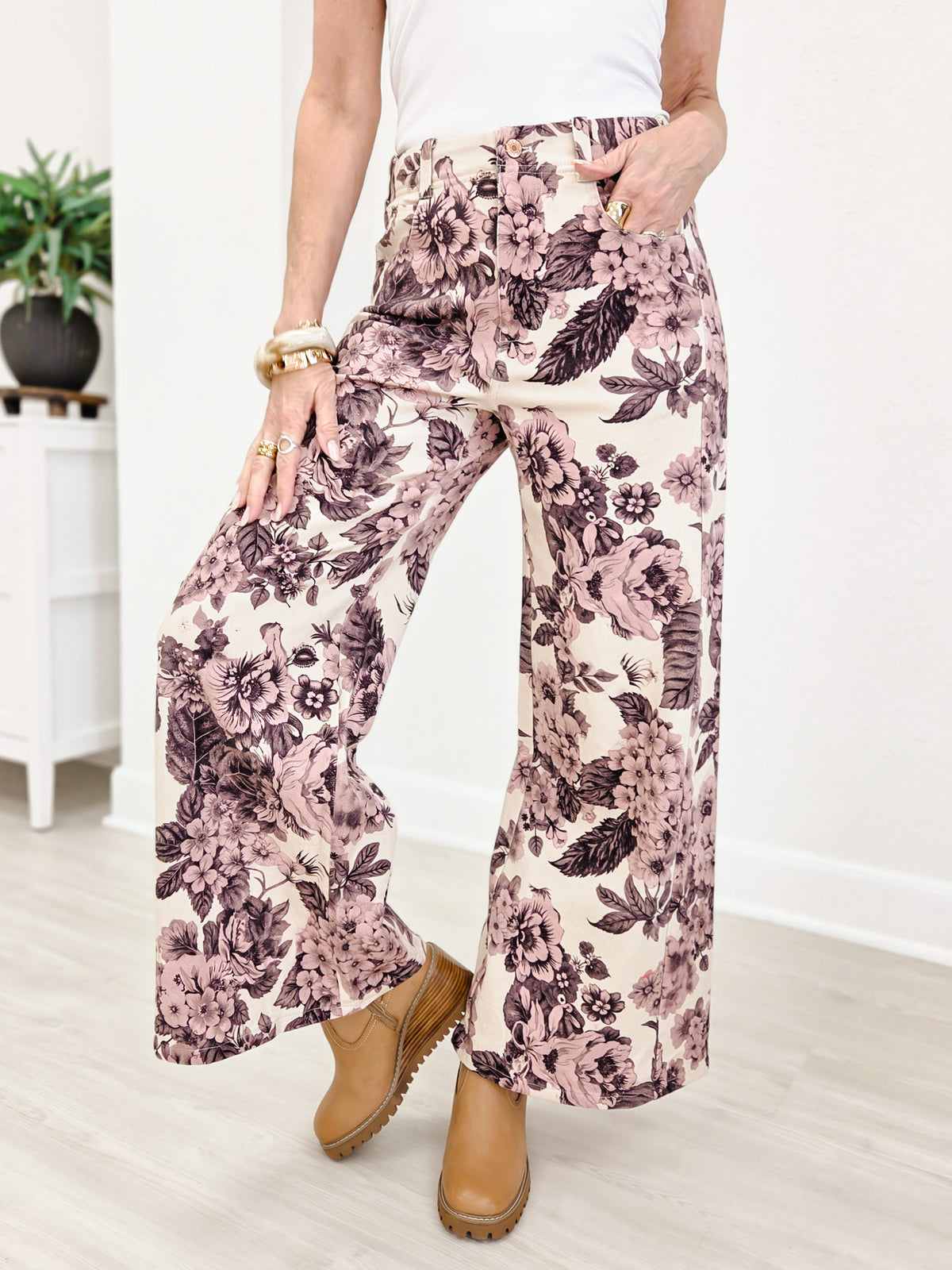 Wide Leg Pants Featuring Front Pockets With A Light Floral Design