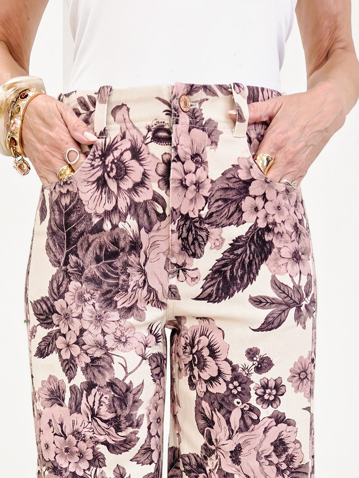 Wide Leg Pants Featuring Front Pockets With A Light Floral Design
