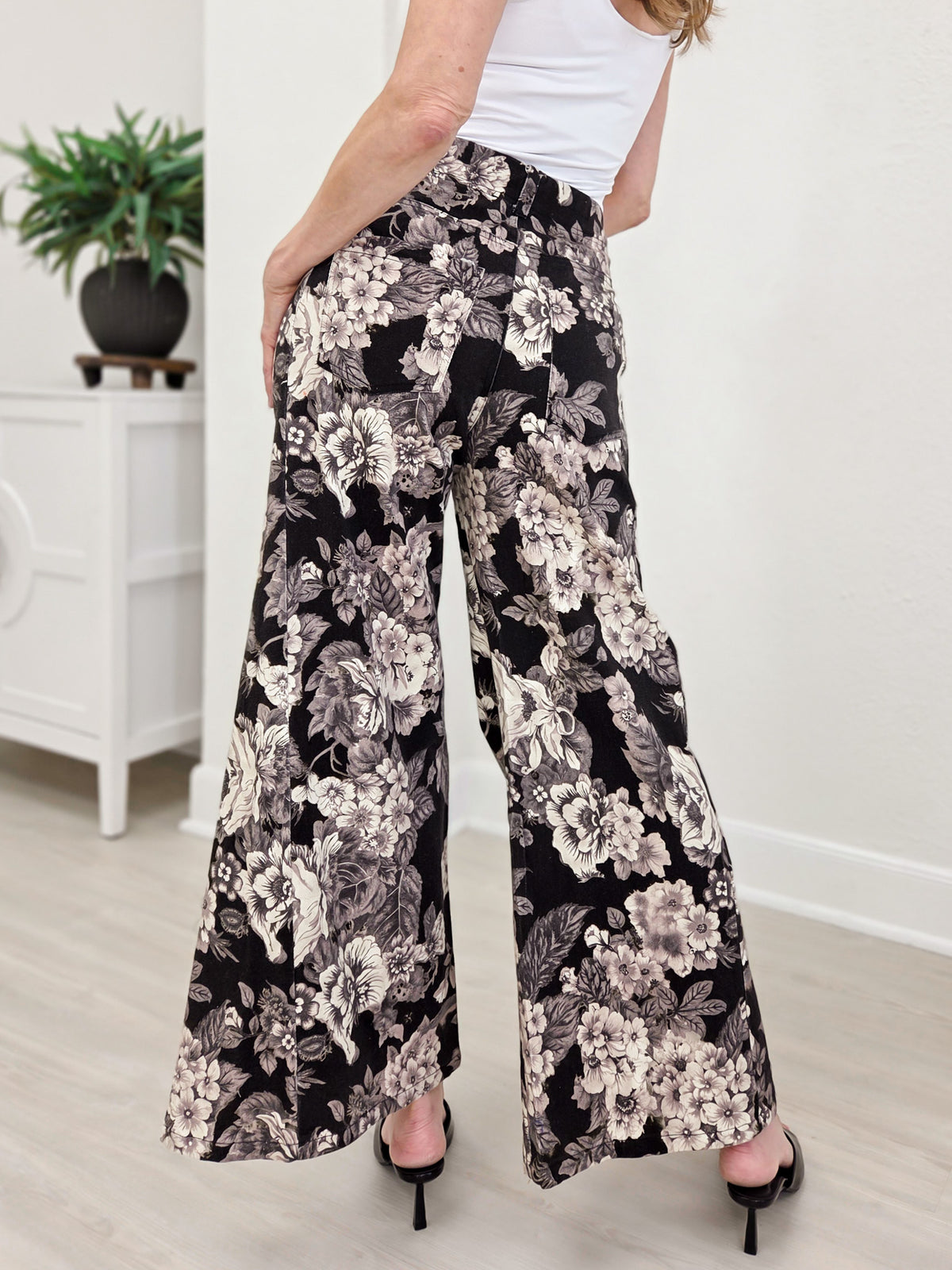 Wide Leg Pants Featuring Front Pockets With A Floral Design
