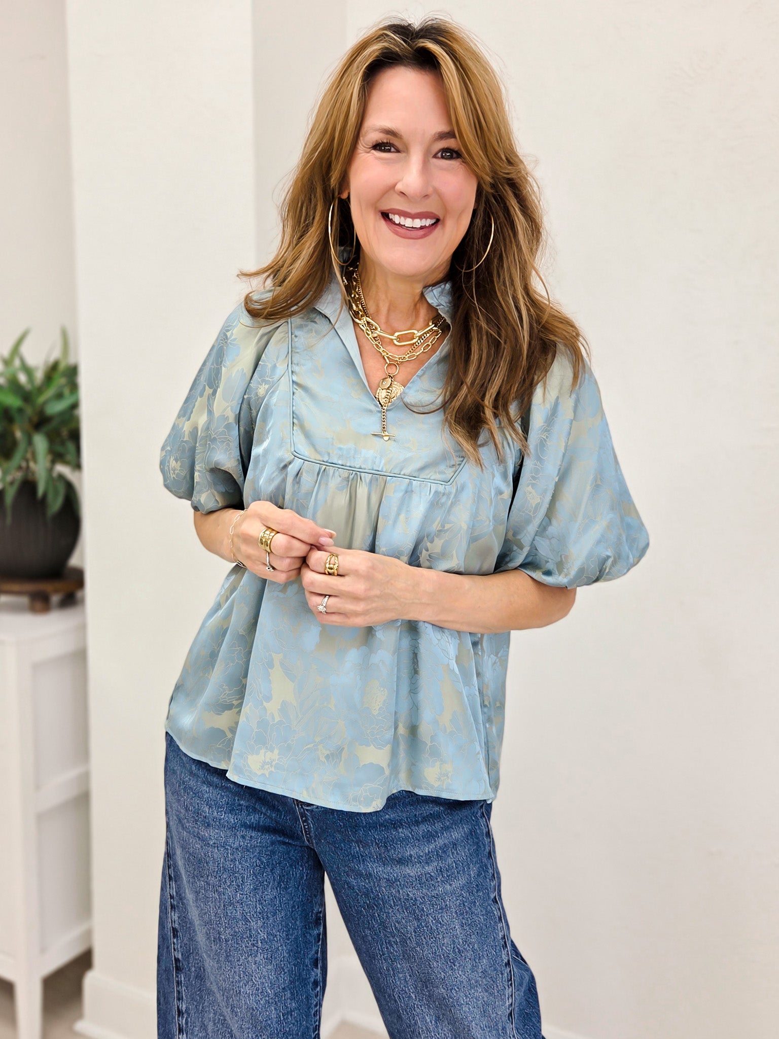 Short Puff Sleeve Top With A Ruffled Neckline And Notched V-Neck