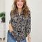 Patterned Bloluse With Ruffeled Neck Line And 3/4 Inch Sleeves