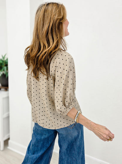 Polka Dot V-Neck Peplum Blouse