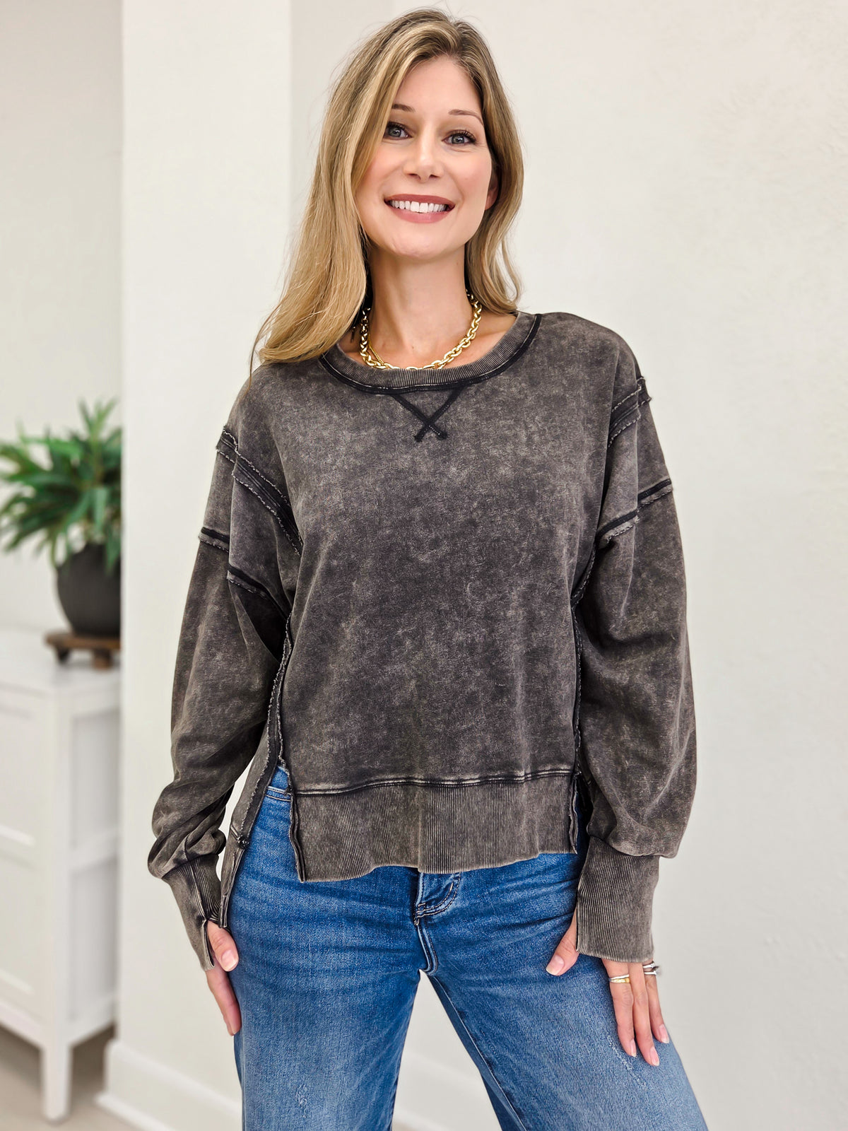 Vintage Washed Sweatshirt Featuring An Exposed Seam