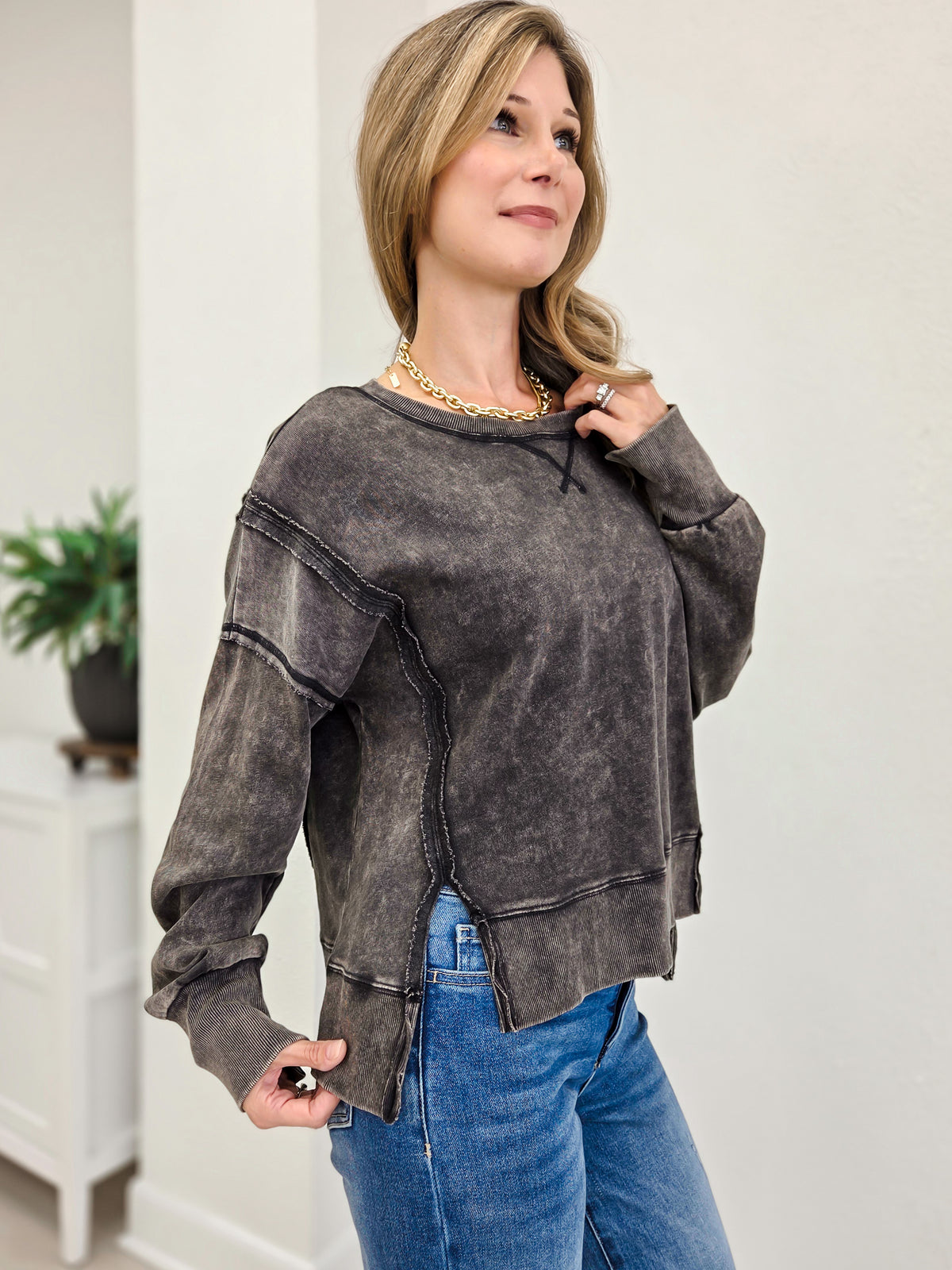 Vintage Washed Sweatshirt Featuring An Exposed Seam