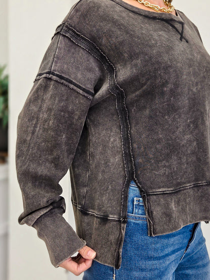 Vintage Washed Sweatshirt Featuring An Exposed Seam