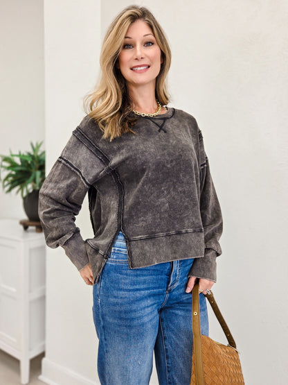 Vintage Washed Sweatshirt Featuring An Exposed Seam