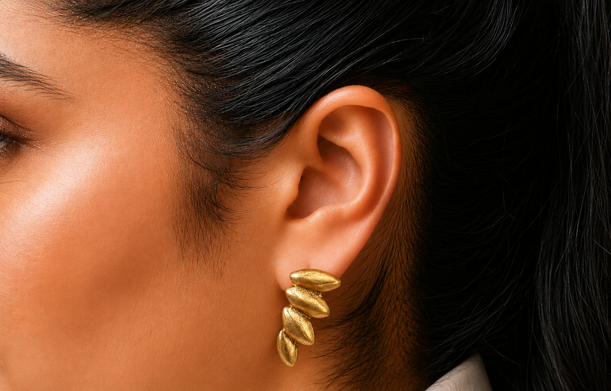 Repurposed gold plated angel wing earring