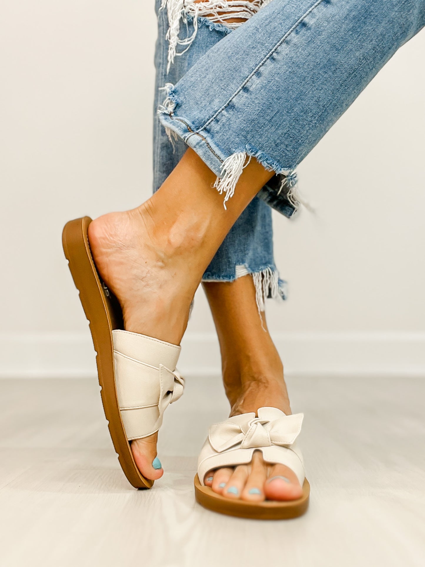 Corkys Rock The Bowt Slide Sandals in IVORY