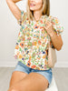 Floral Print Short Sleeve Ruffled Tie Neck Top