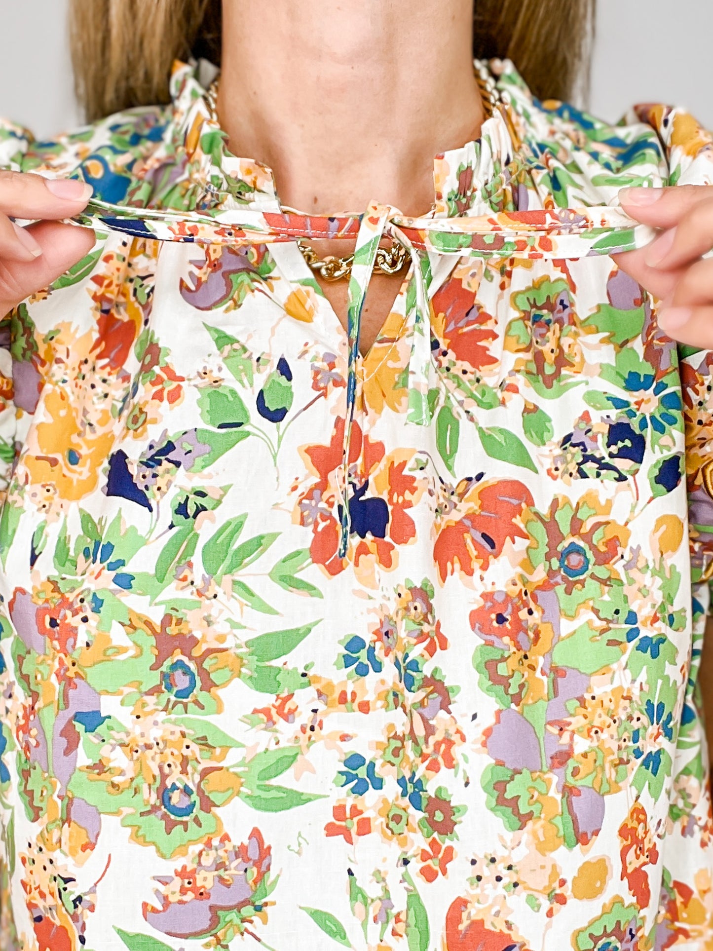 Floral Print Short Sleeve Ruffled Tie Neck Top