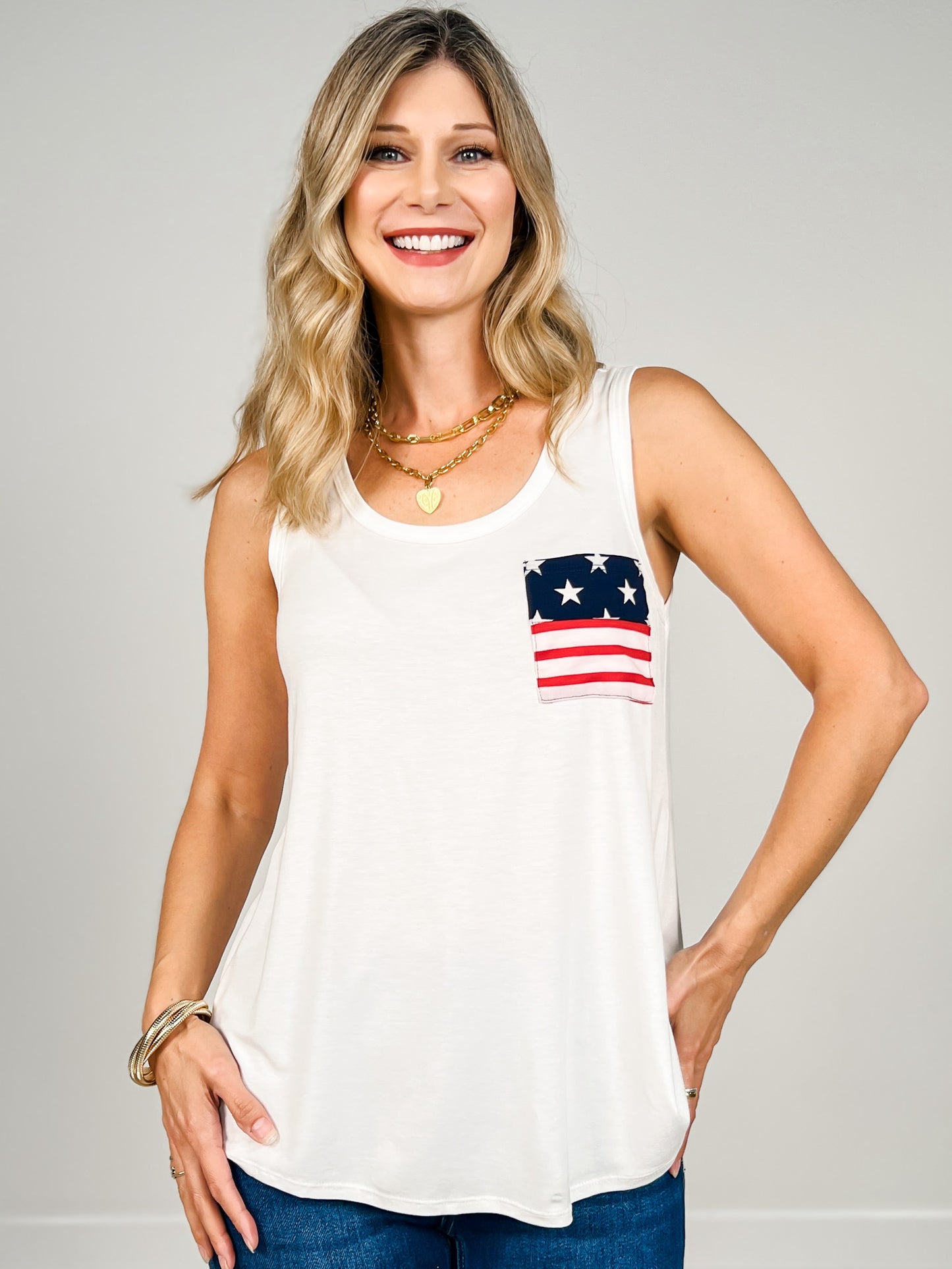 Sleeveless Solid Top With Star And Stripe Pocket