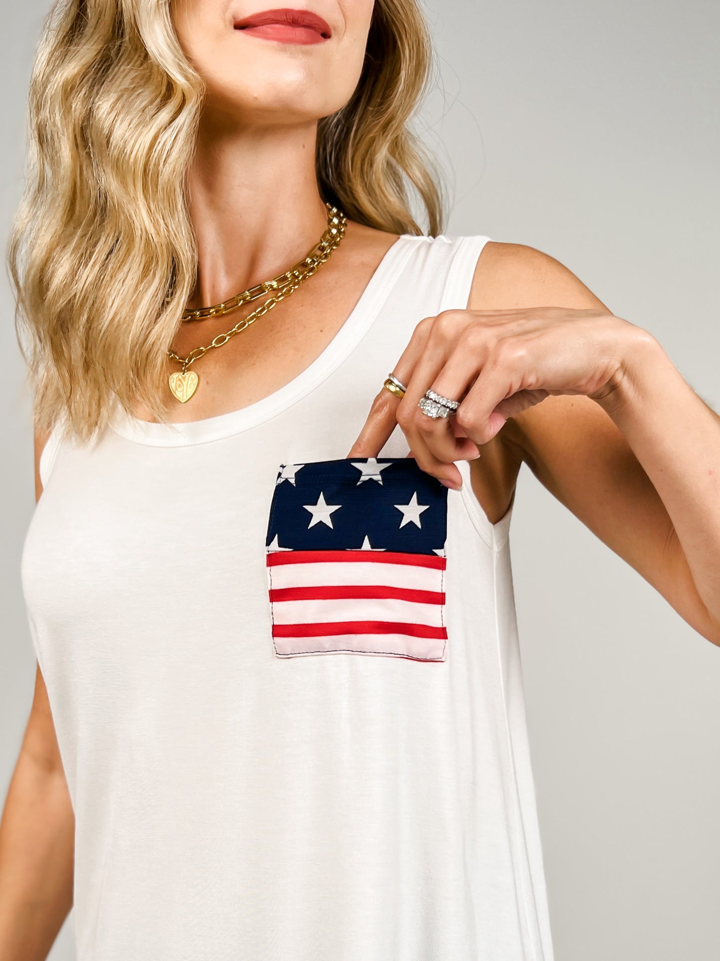 Sleeveless Solid Top With Star And Stripe Pocket