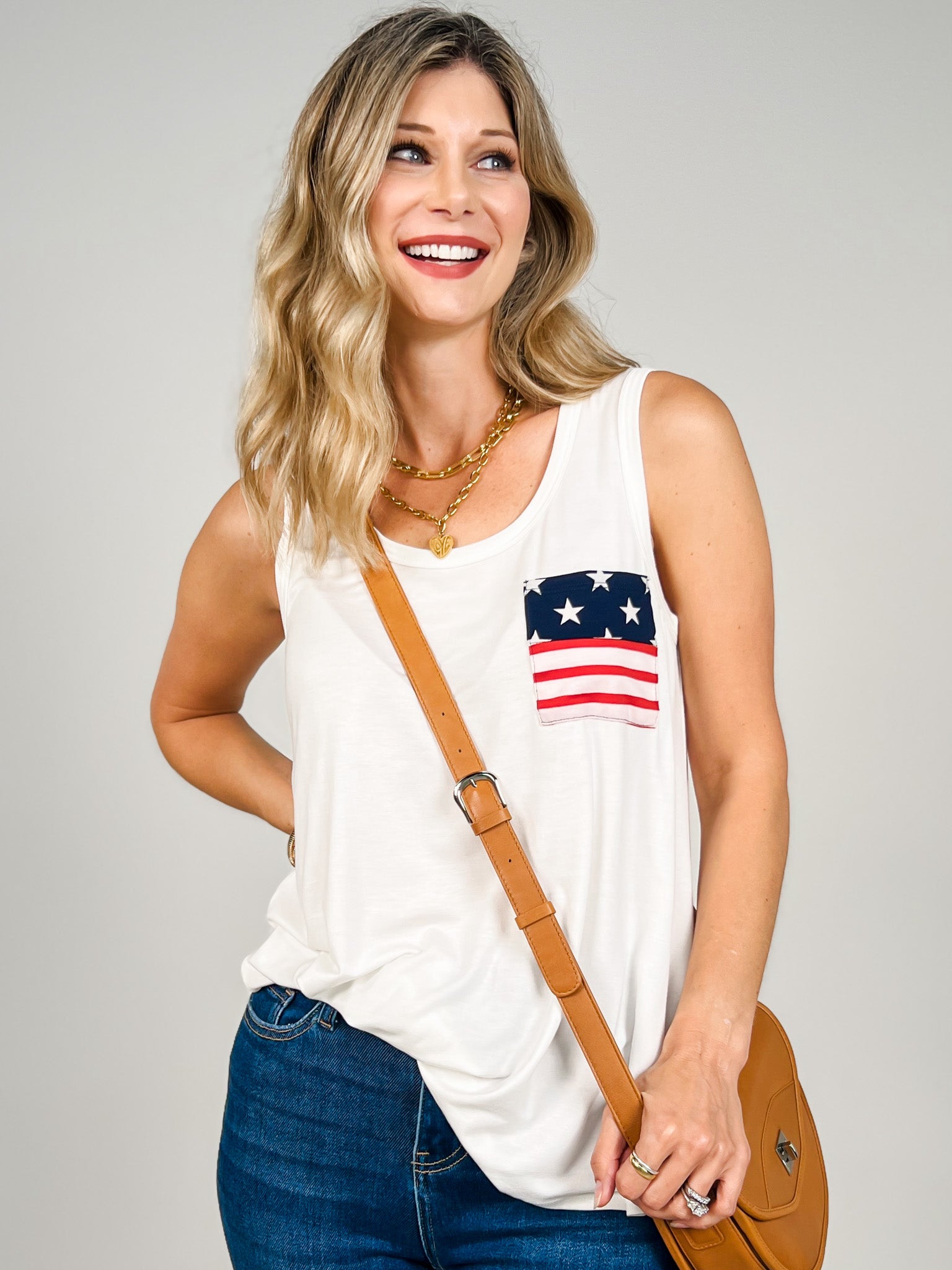 Sleeveless Solid Top With Star And Stripe Pocket