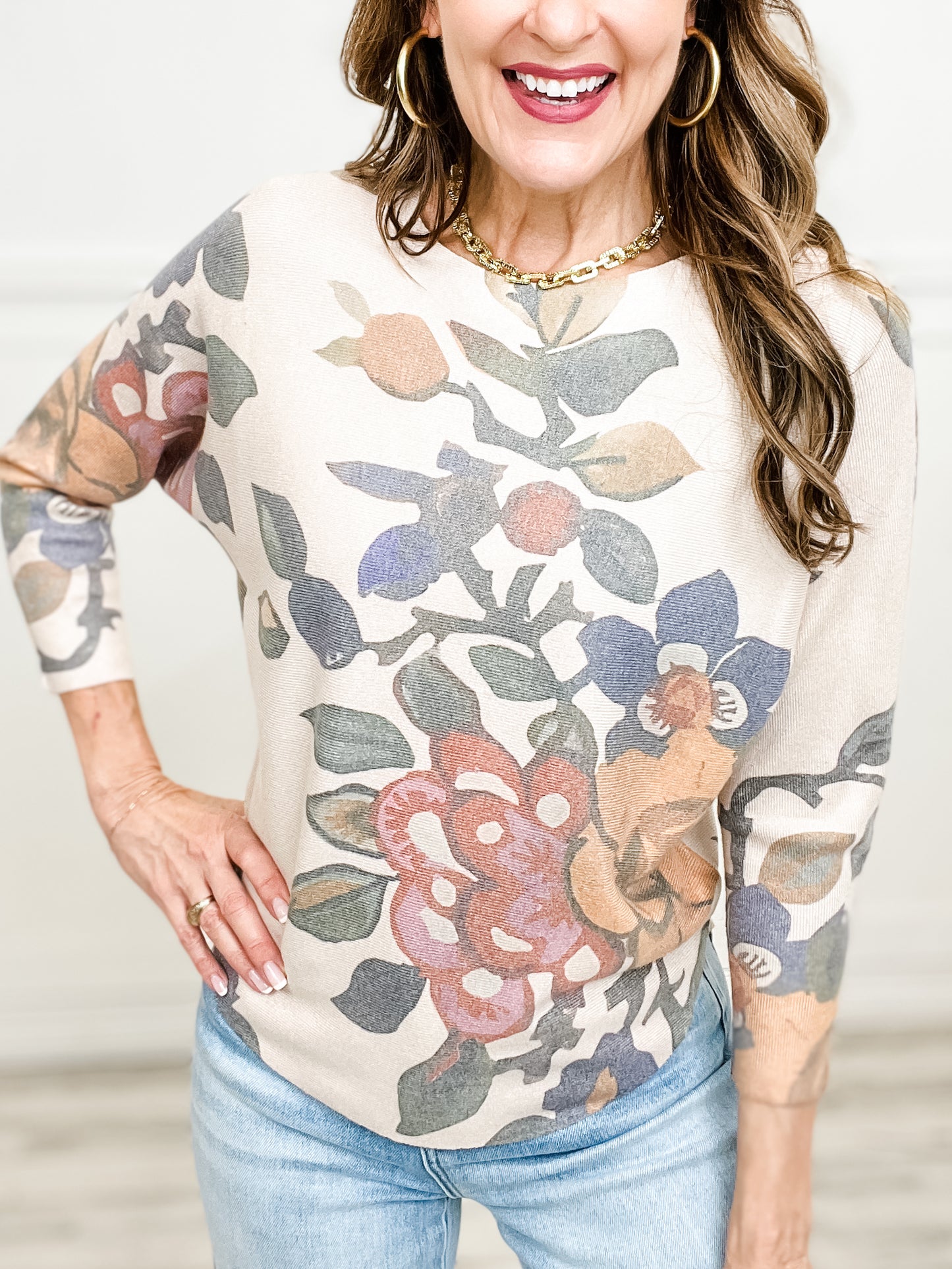 Three Quarter Length Sweater Top with Floral Print and Rounded Hemline