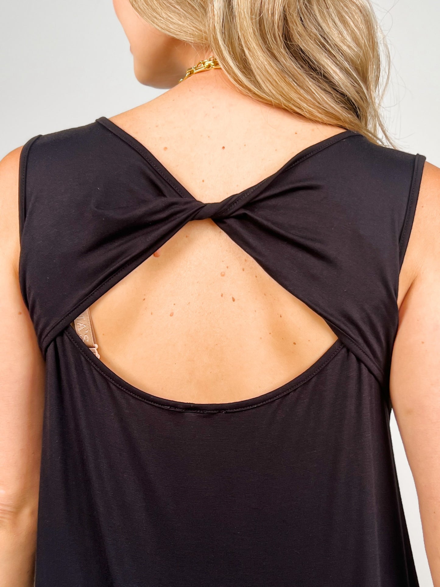Solid Sleeveless Top With Crisscross Back