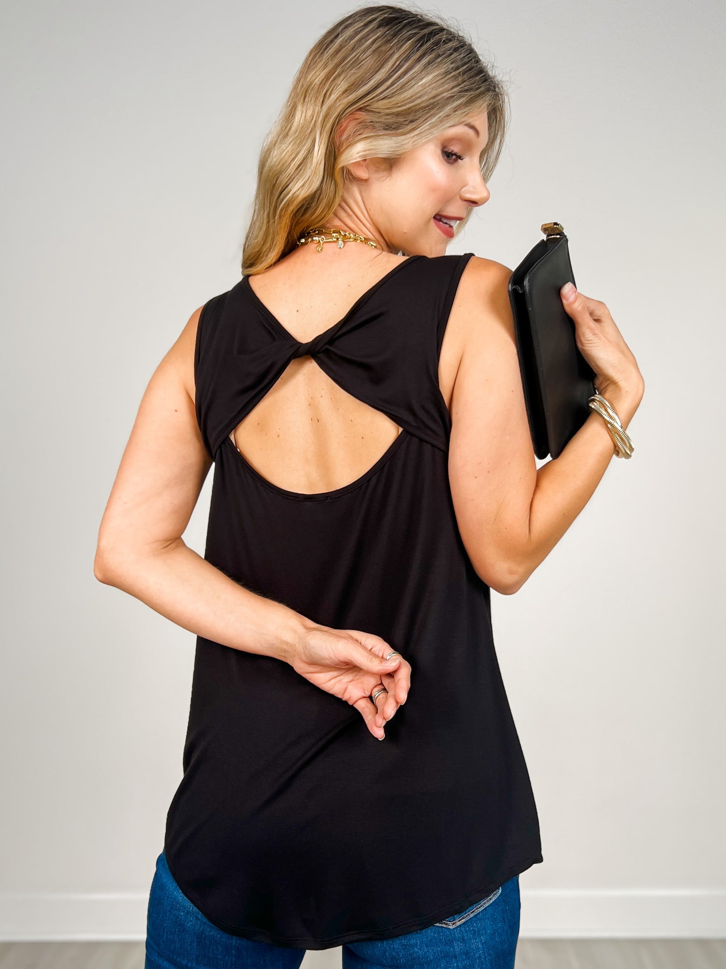 Solid Sleeveless Top With Crisscross Back