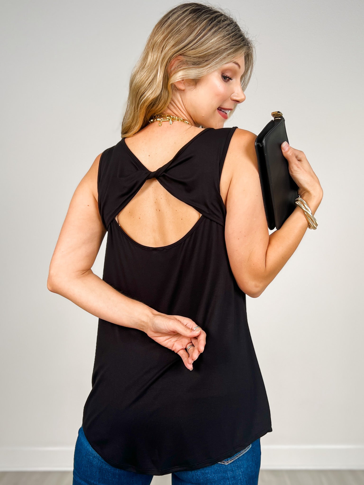 Solid Sleeveless Top With Crisscross Back