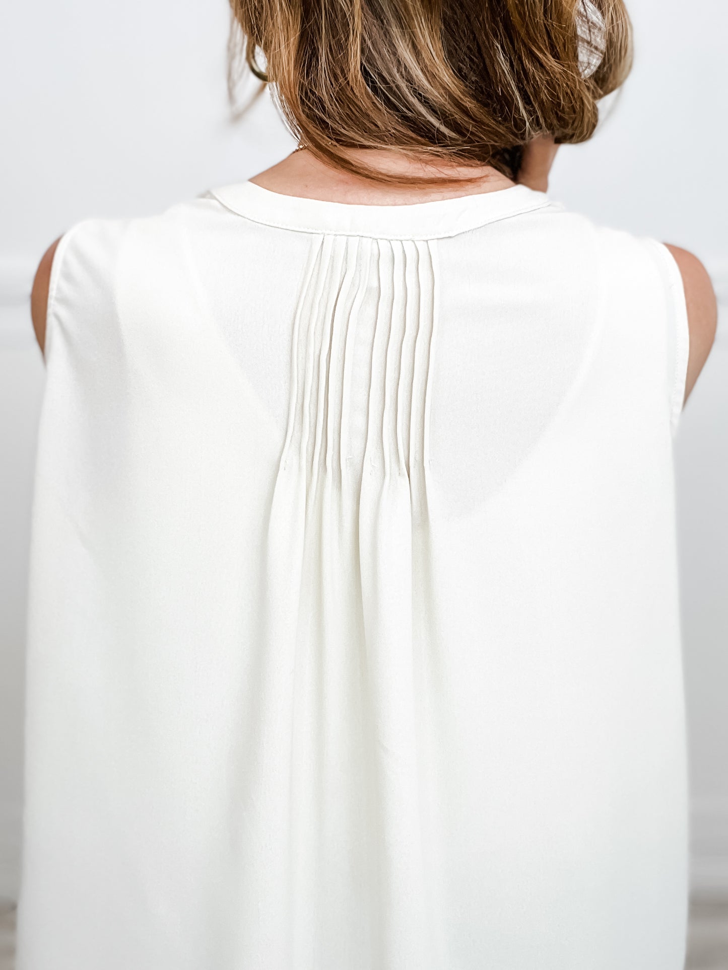 Sleeveless Woven Top With Back Pintuck Detail