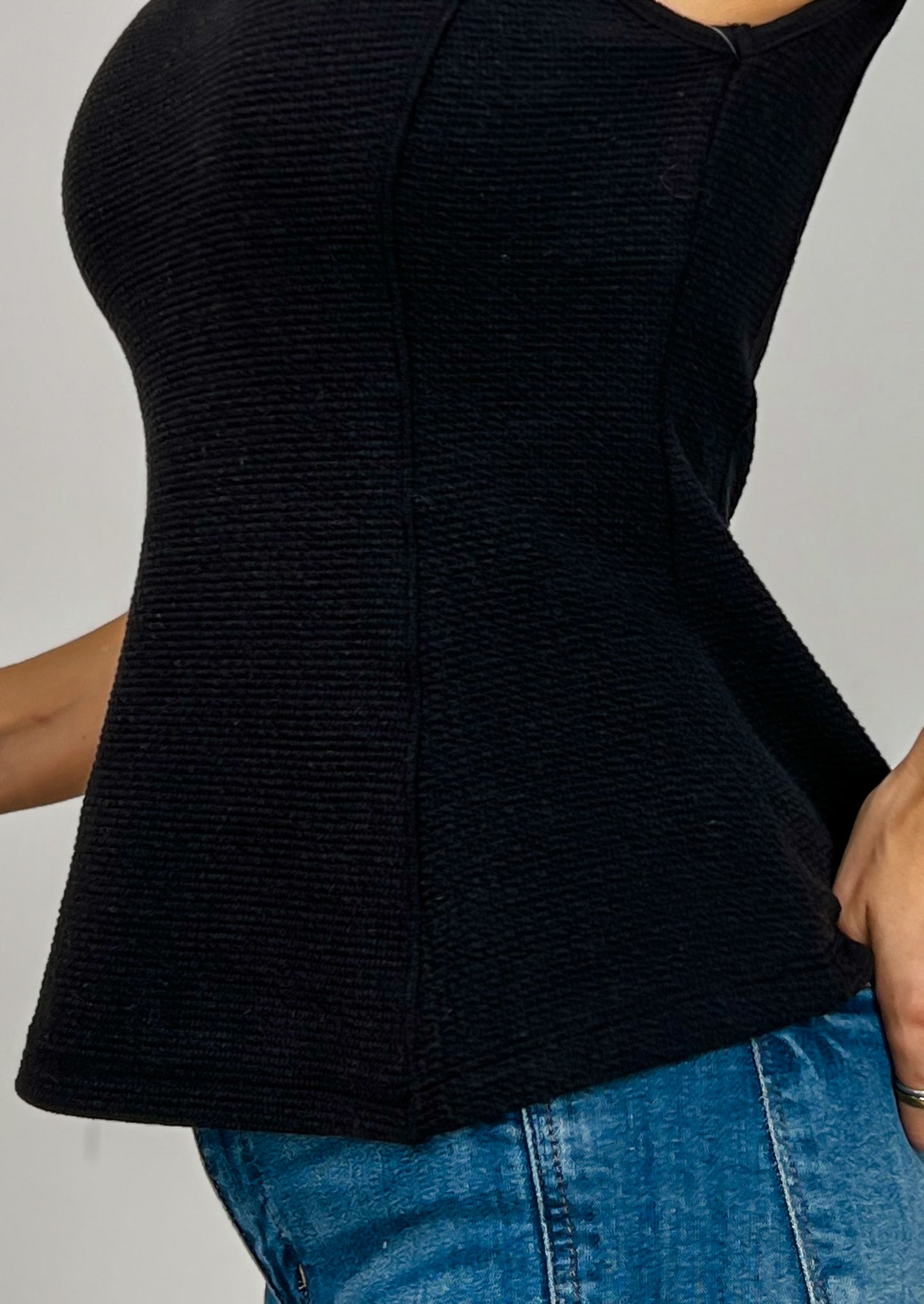Sleeveless Round Neck Peplum Cloudy Knit Top