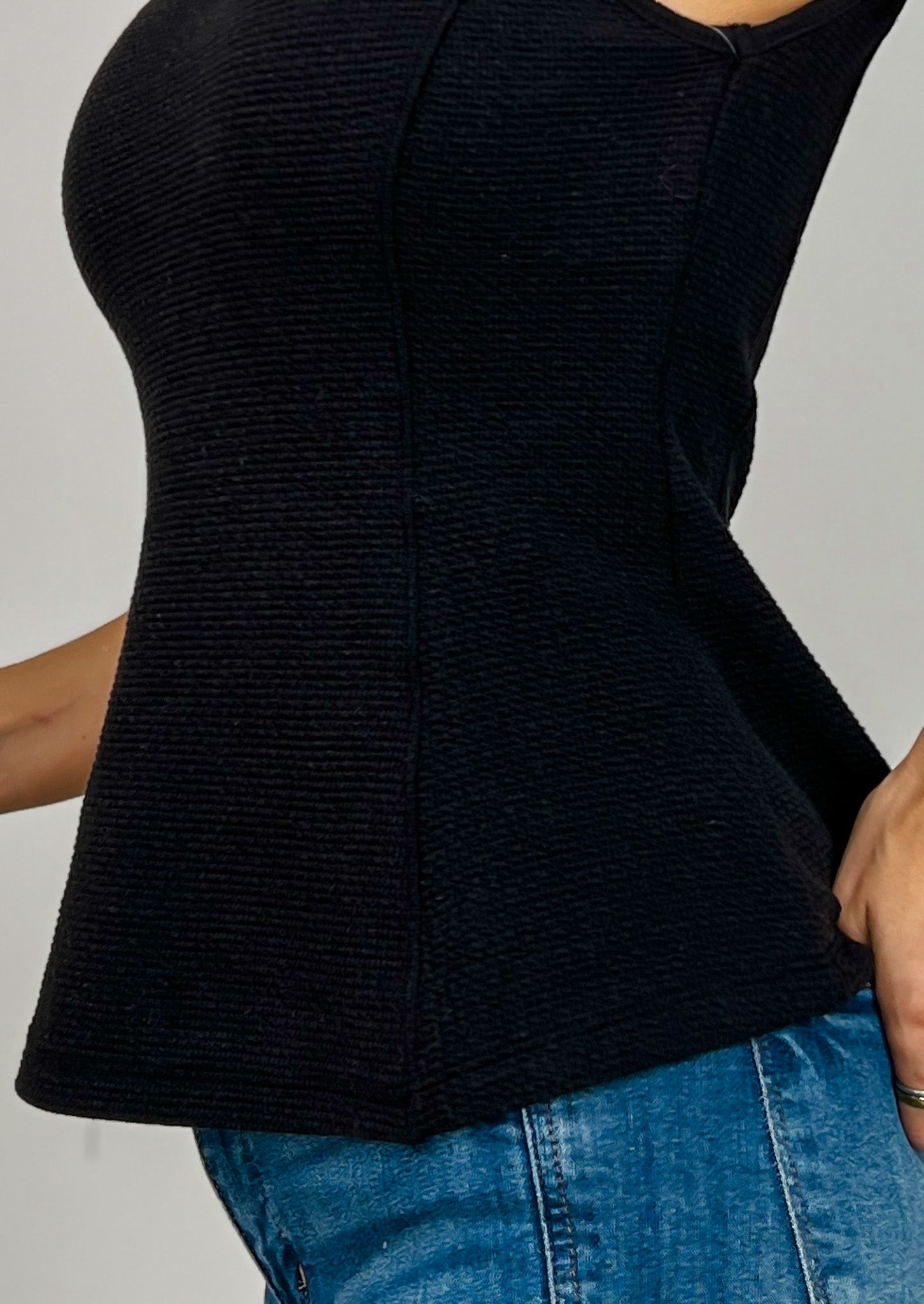 Sleeveless Round Neck Peplum Cloudy Knit Top