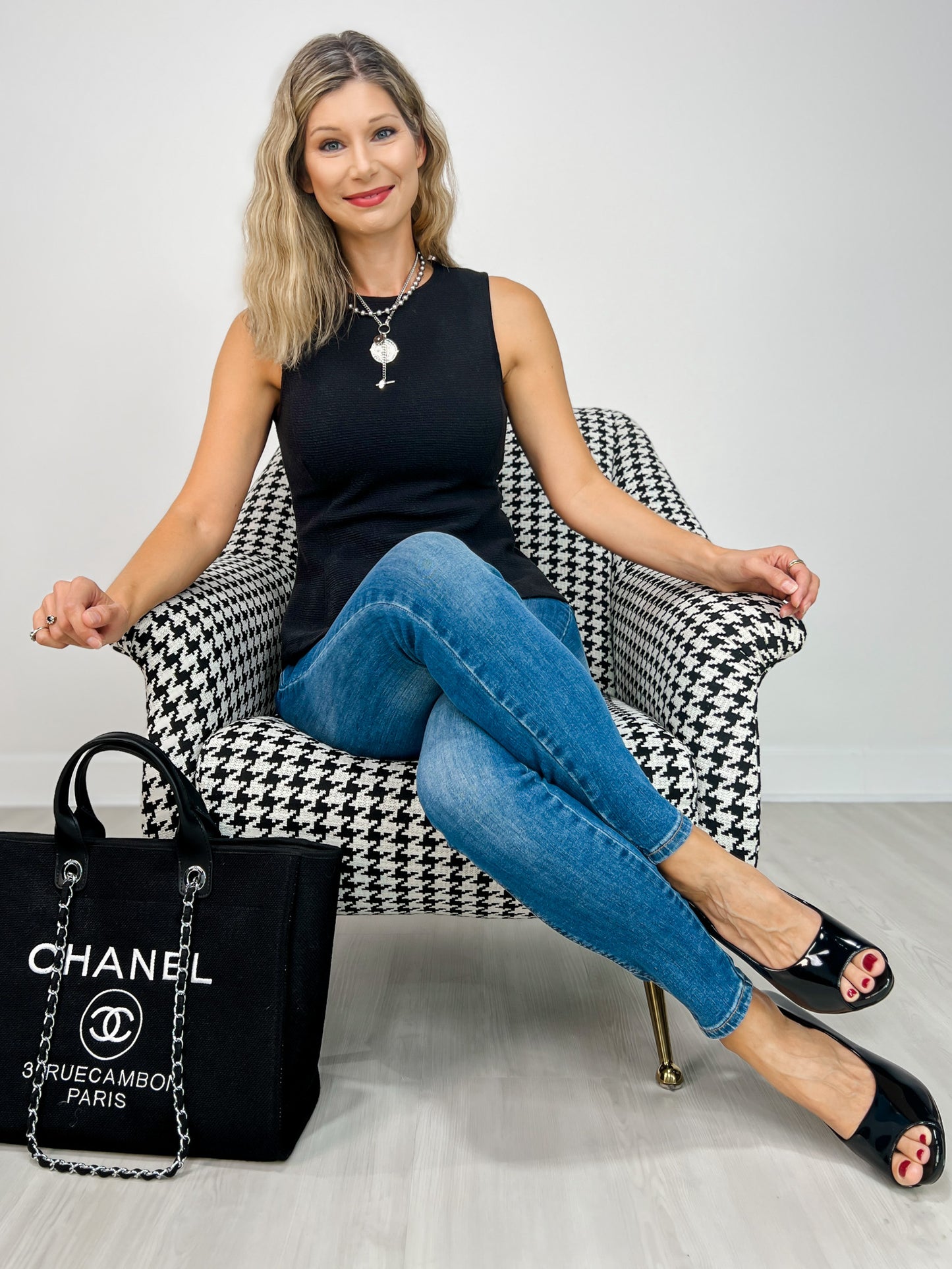 Sleeveless Round Neck Peplum Cloudy Knit Top