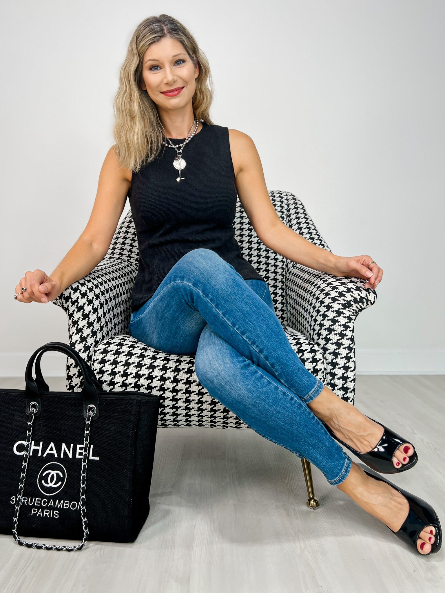 Sleeveless Round Neck Peplum Cloudy Knit Top