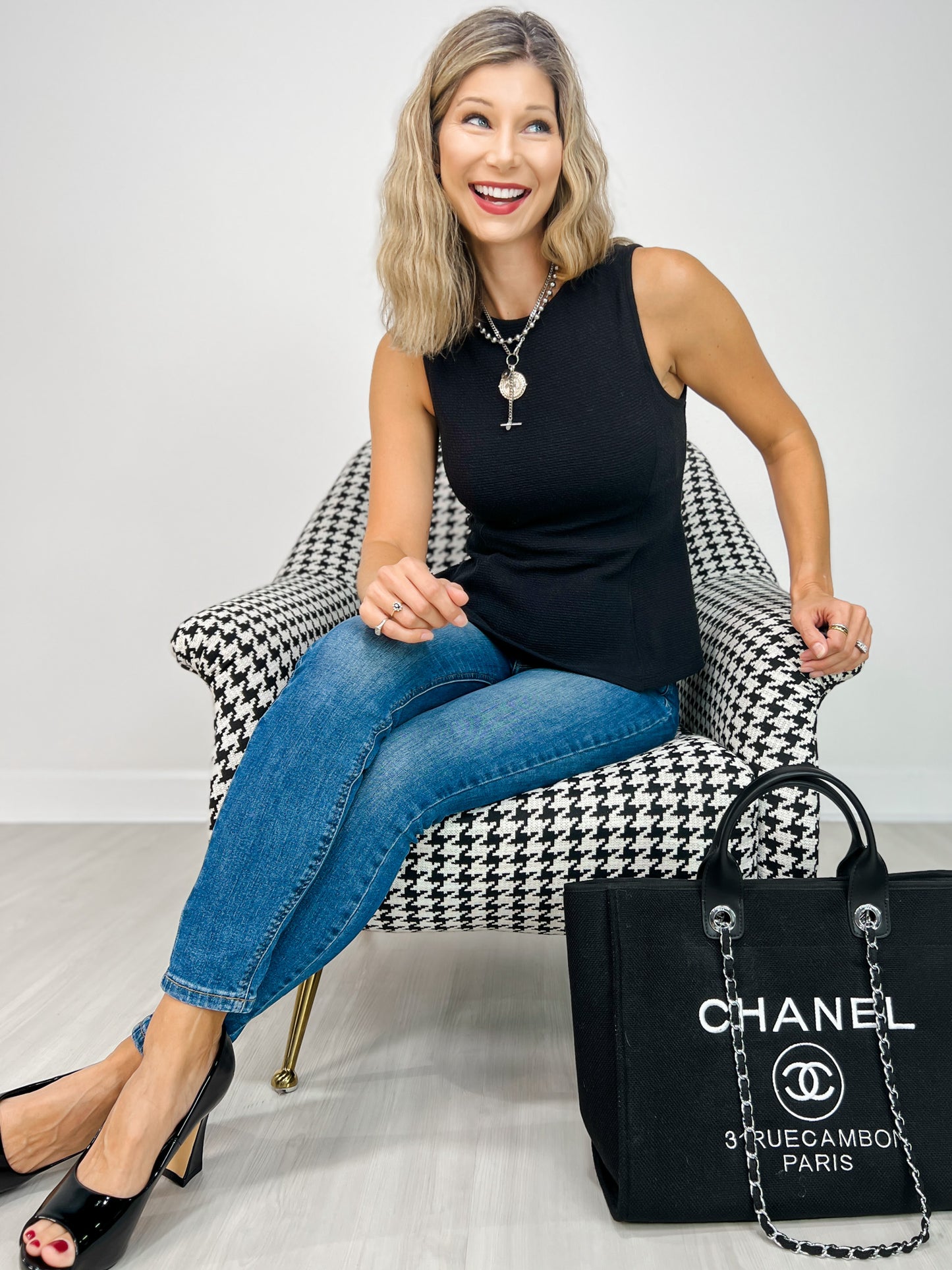 Sleeveless Round Neck Peplum Cloudy Knit Top