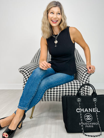 Sleeveless Round Neck Peplum Cloudy Knit Top