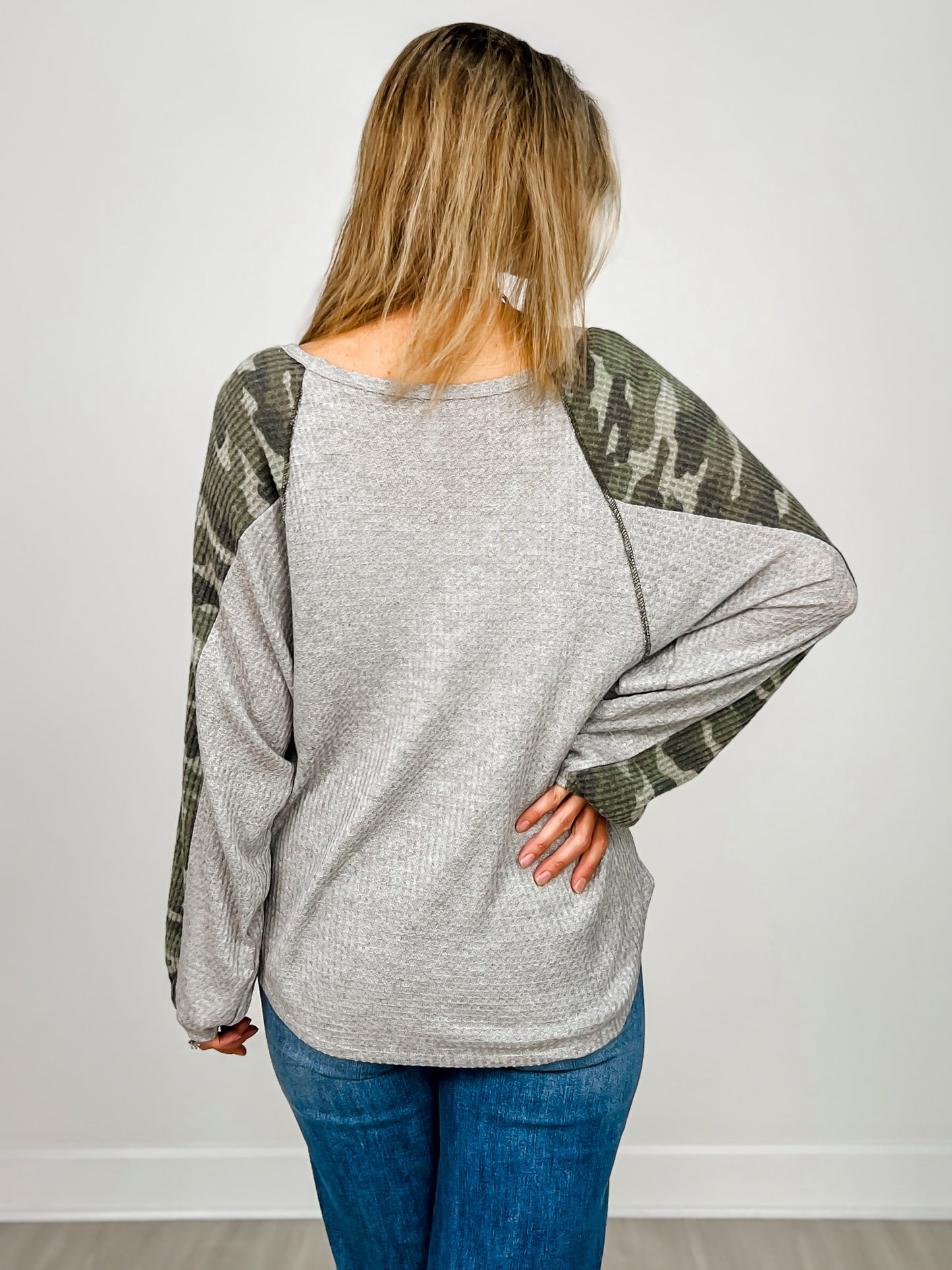 Oversized V-Neck Waffle Top with Camo Sleeves and Round Hem