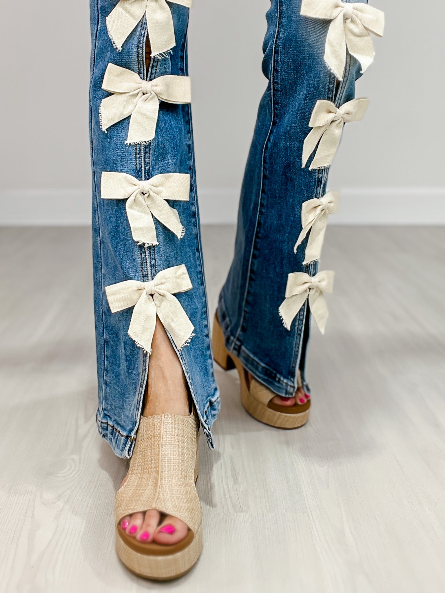 Ribbon Detail Stretchy Flared Jeans with Front Hem Slits – Emma Ribbon Detail Stretchy Flared Jeans with Front Hem Slits – Emma