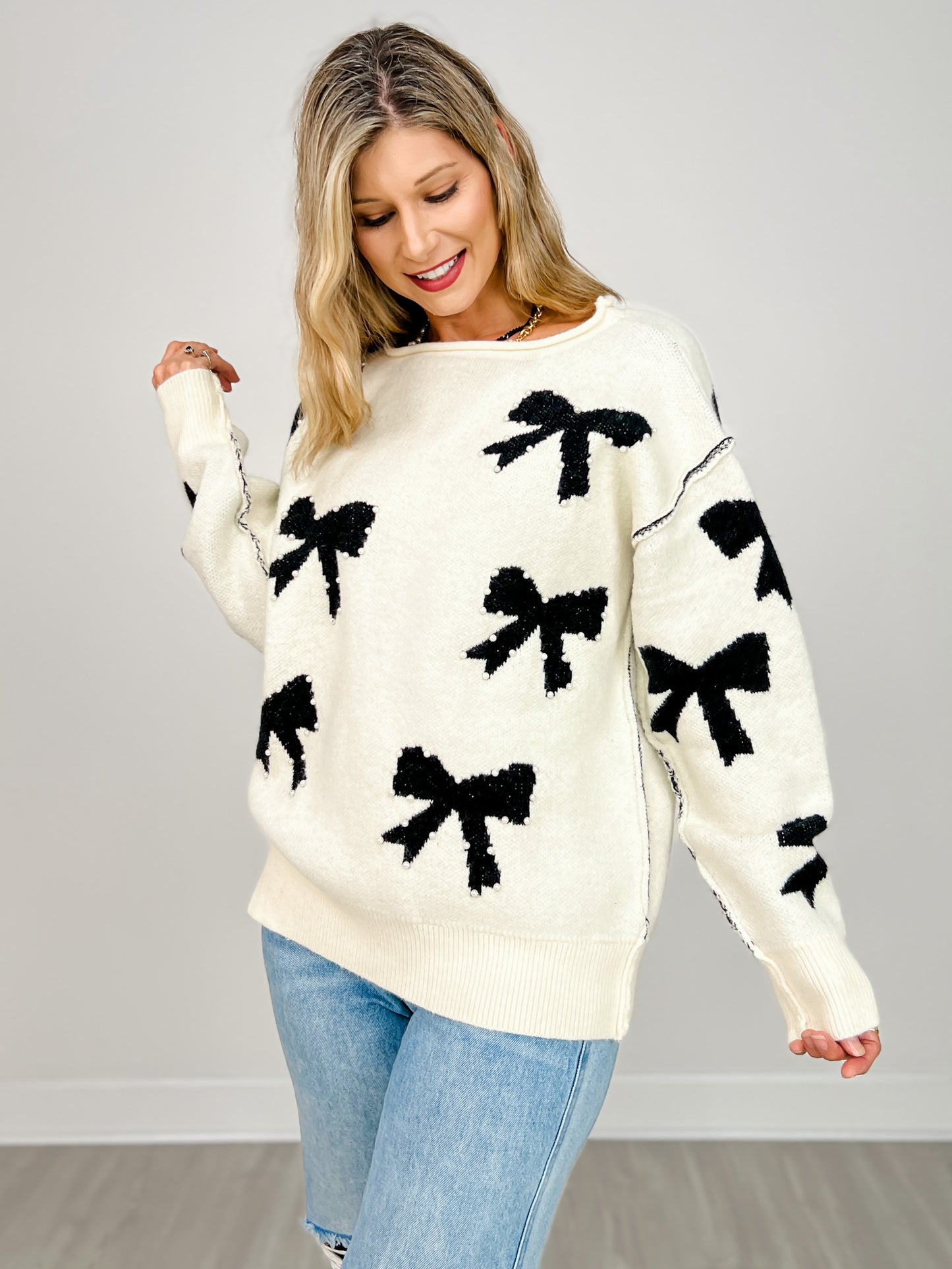 Long Sleeve Sweater with Knit Bows and Pearl Accents
