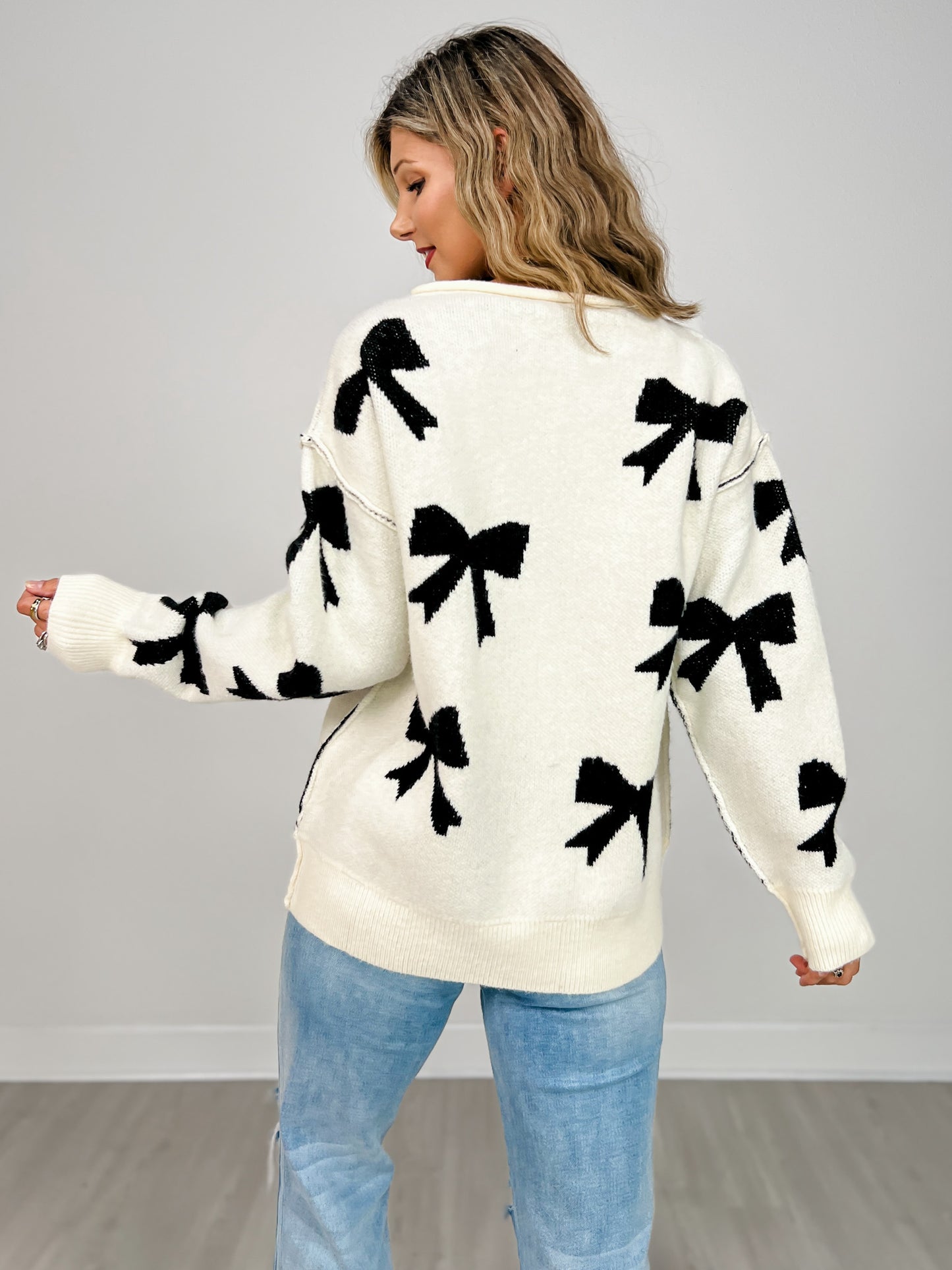 Long Sleeve Sweater with Knit Bows and Pearl Accents