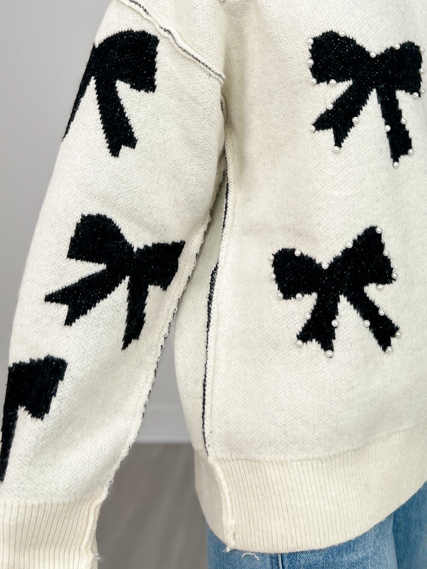 Long Sleeve Sweater with Knit Bows and Pearl Accents