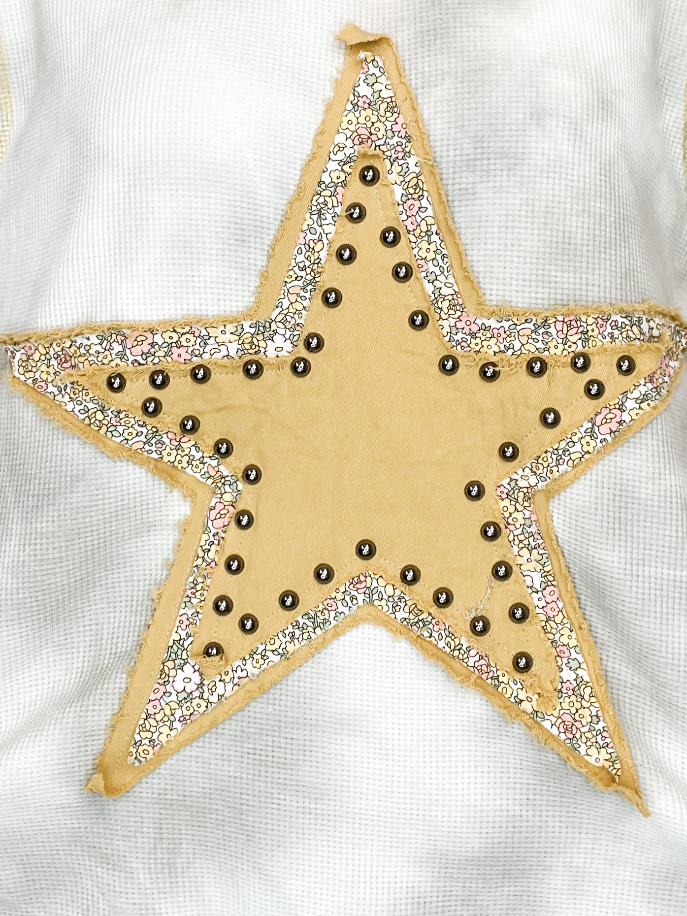 Vintage washed star patch with stud knit top