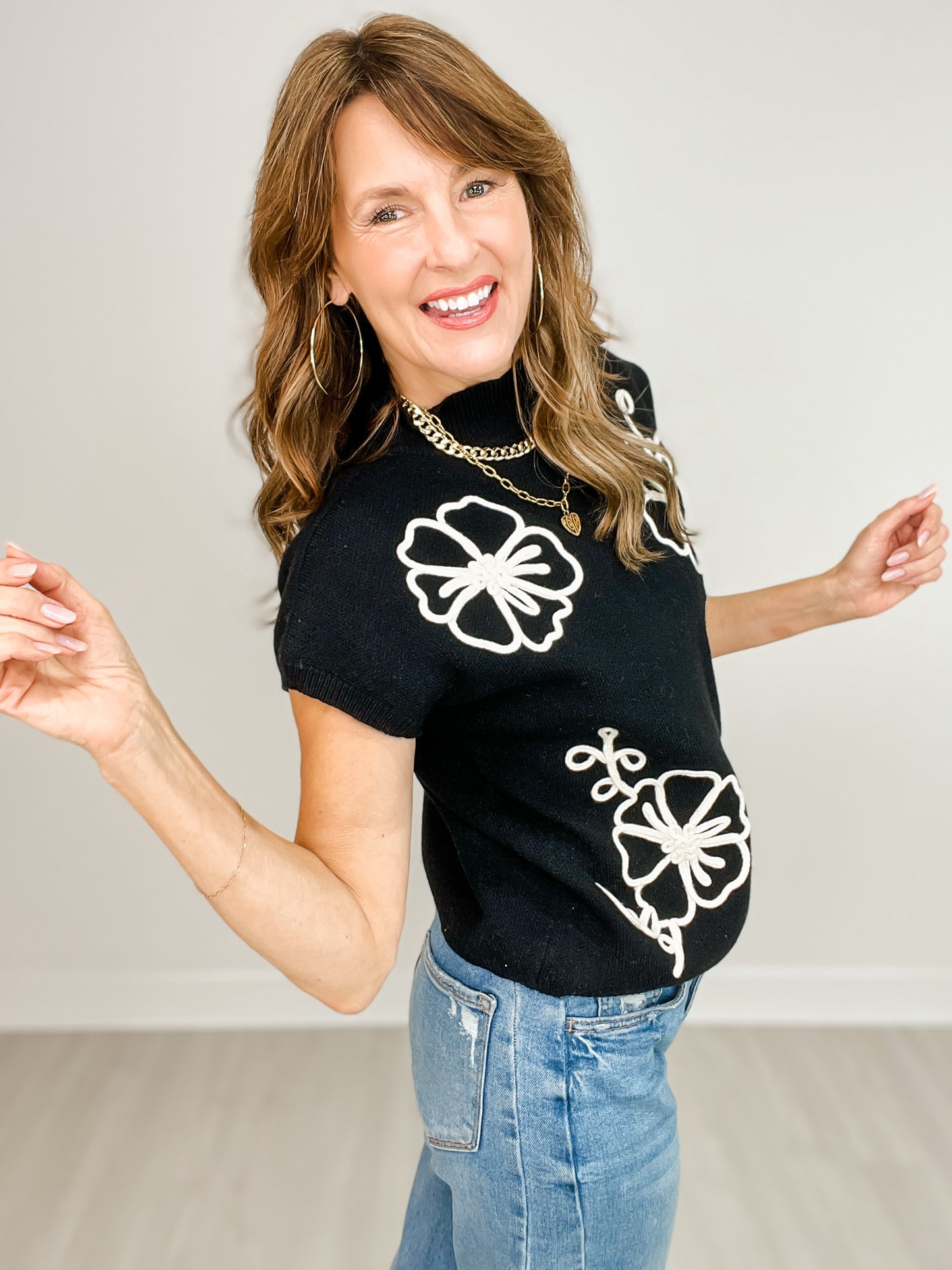 Sleeveless Mock Neck Contrast Floral Trim Knit Sweater