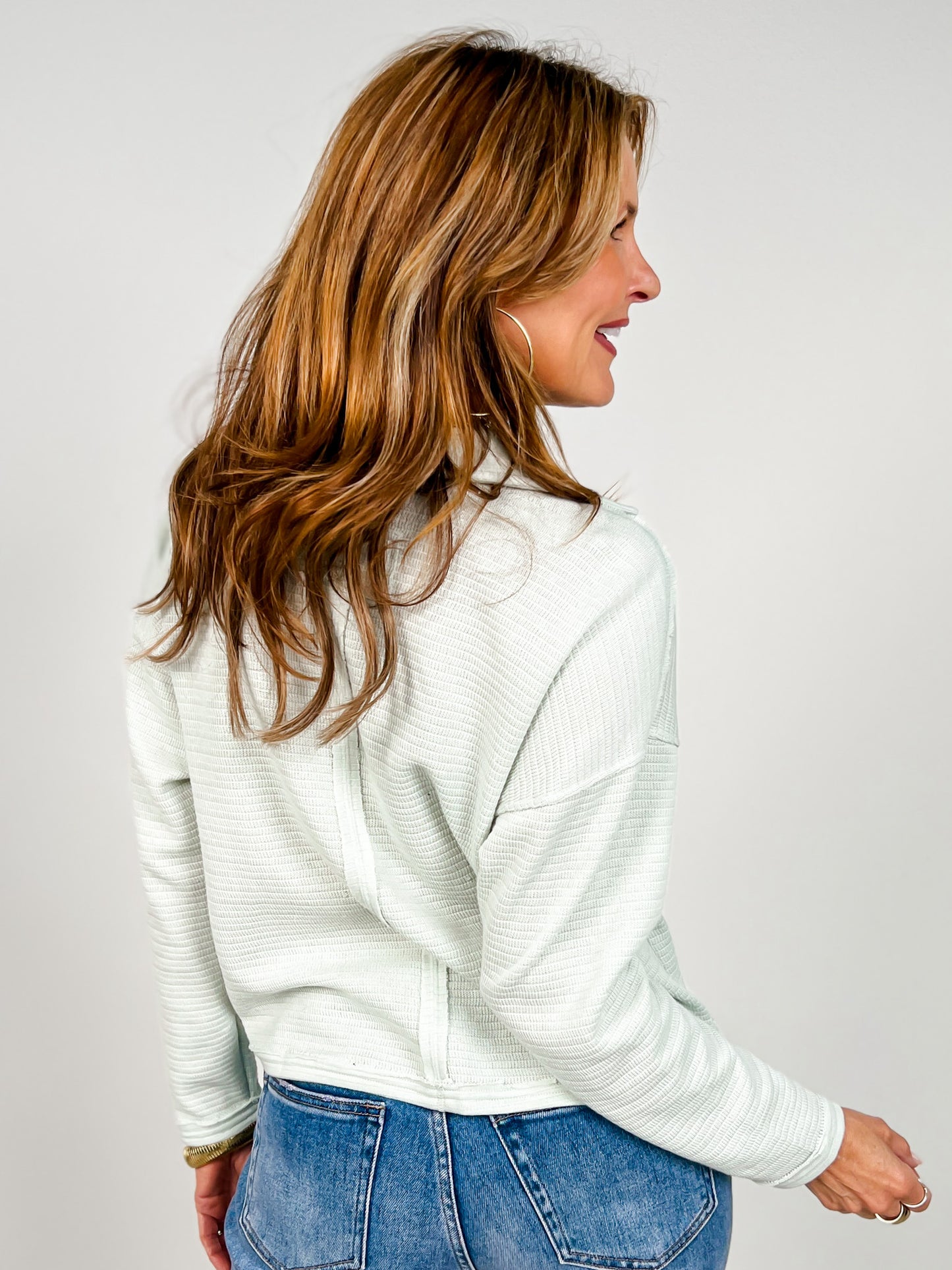 Exposed Seam Long Sleeve Textured Knit Polo