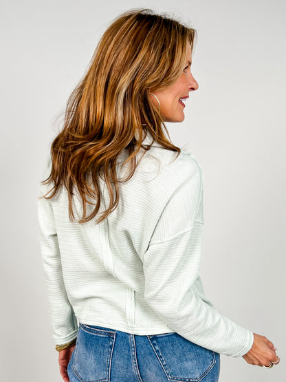Exposed Seam Long Sleeve Textured Knit Polo