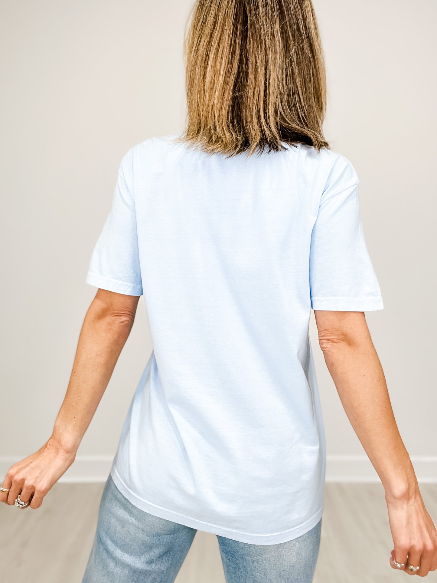 Mama Clothed in Strength Gold Foil Graphic Tee