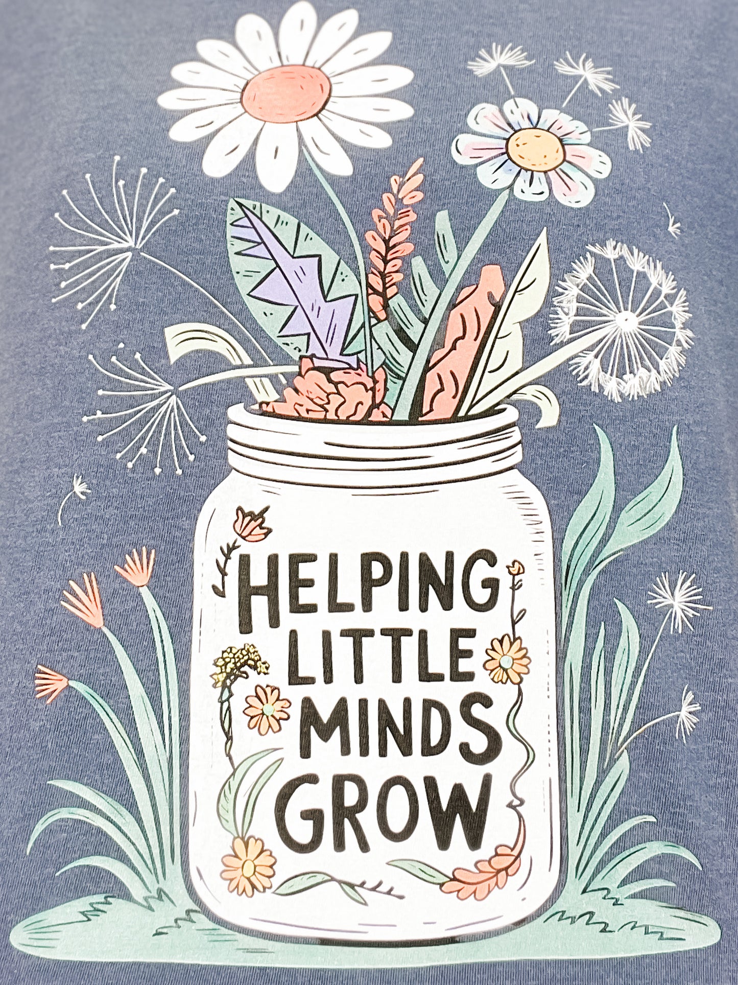 Helping Little Minds Grow Graphic Tee
